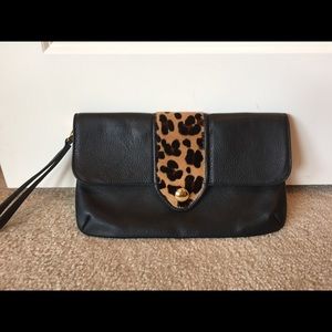 Linell Ellis leather clutch with animal print